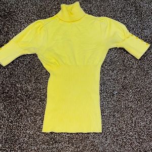 Yellow turtleneck shirt
